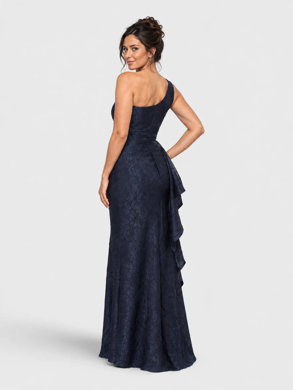 Vestido longo de festa azul-marinho em zibeline floral em relevo, visto por trás.